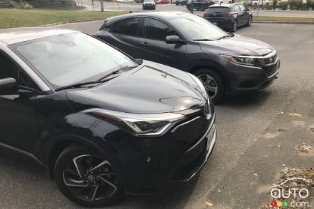 The 2020 Toyota C-HR, next to a much more sober CR-V